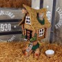 Handmade ceramic house on chicken leg
