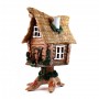 Handmade ceramic house on chicken leg