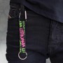 Neon Lithuania keychain attached to jeans