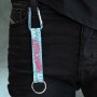 Close-up of blue Lithuania keychain with carabiner