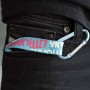 Lithuania keychain attached to jeans with carabiner