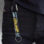 Close-up of black Lithuania keychain with yellow text