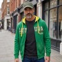 Man wearing a green Lithuania Original cap